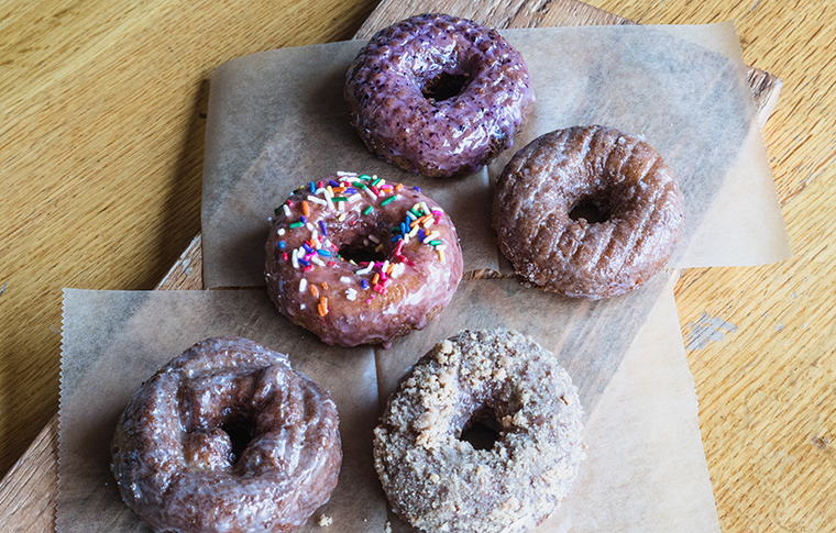various donuts laid out on display